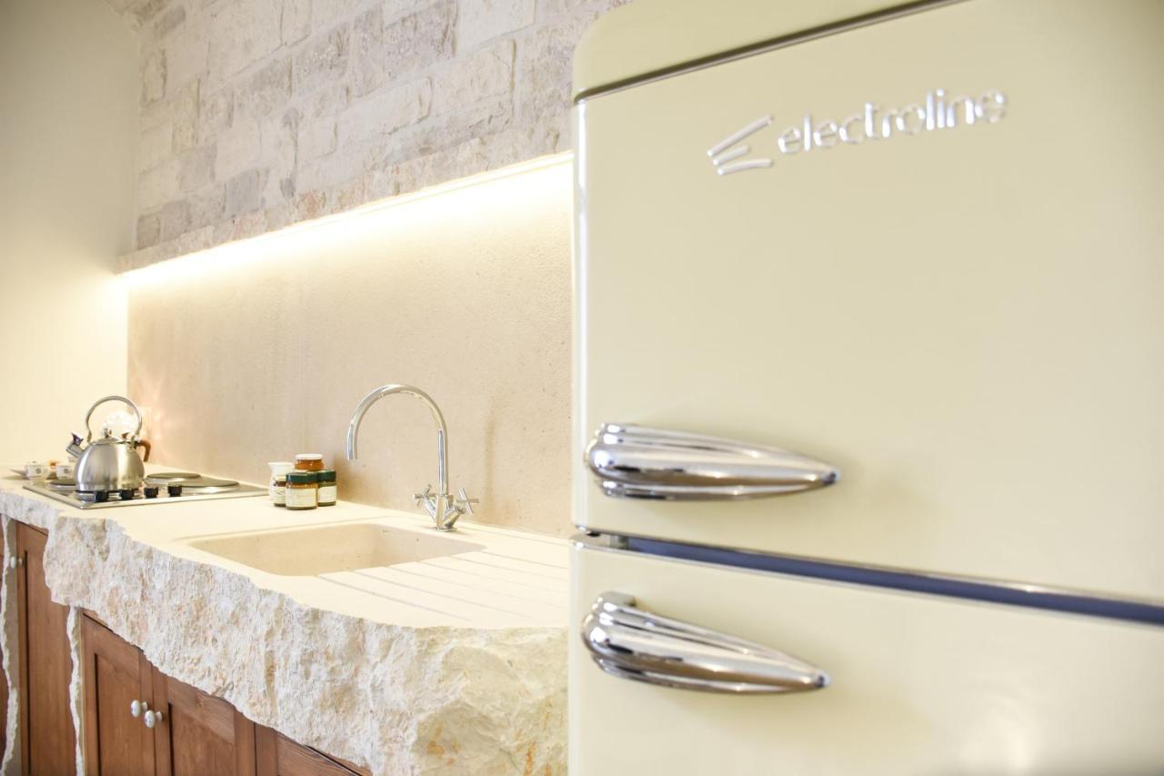 Trulli E Puglia Luxury Suite อัลเบโรเบลโล ภายนอก รูปภาพ
